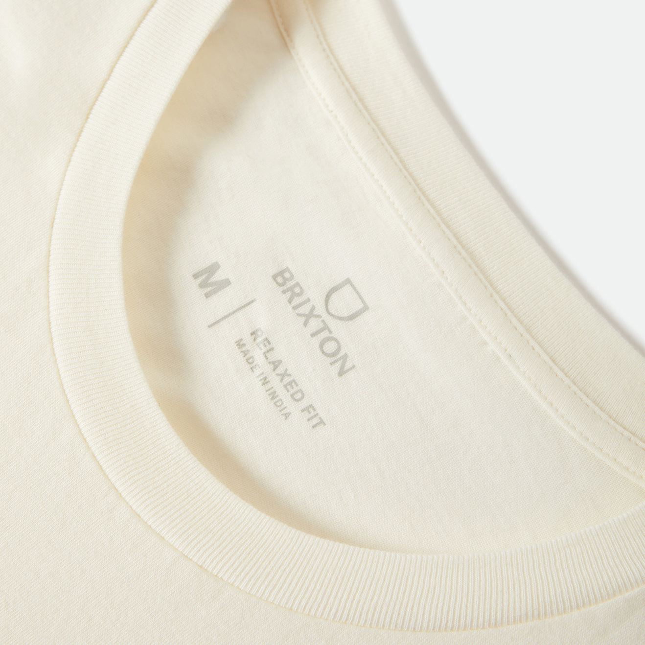 WOLCOTT WORN IN BOXY MUSCLE TANK - OFF WHITE